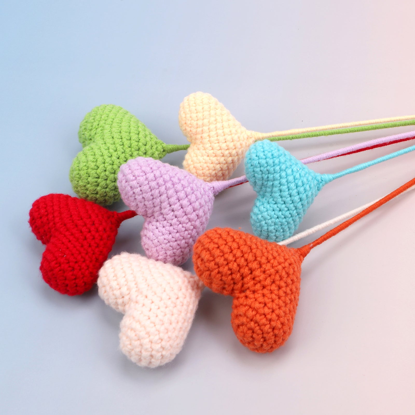 Handmade crochet heart-shaped flower stem